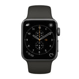 Musta Apple Watch tumman harmaan silikonirannekkeen kanssa, analoginen kellotaulu