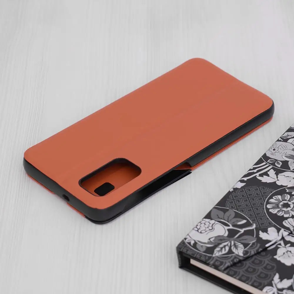 Samsung Galaxy A13 5G / A04s Flip suojakuori - Oranssi